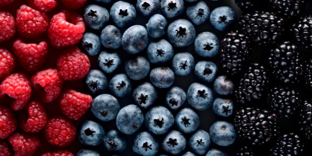 ÃÂ¡olorful flag with fruits of the forest