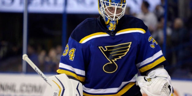 St. Louis Blues goalie Jake Allen pauses during a timeout during the third period of an NHL hockey game against the Calgary Flames Thursday, April 2, 2015, in St. Louis. The Blues won 4-1. (AP Photo/Jeff Roberson)