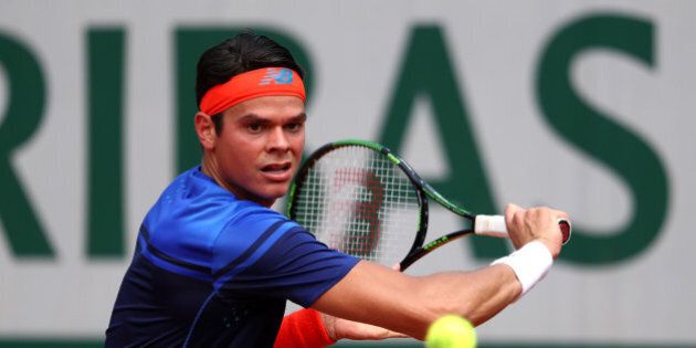 PARIS, FRANCE - MAY 27: Milos Raonic of Canada hits a backhand during the Men's Singles third round match against Andrej Martin of Slovakia on day six of the 2016 French Open at Roland Garros on May 27, 2016 in Paris, France. (Photo by Julian Finney/Getty Images)