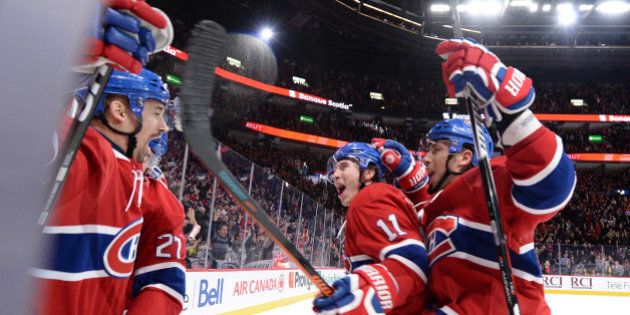 MONTREAL, QC - FEBRUARY 9:Tomas Plekanec #14 of the Montreal Canadiens celebrates after scoring a goal against Ben Bishop #30of the Tampa Bay Lightning in the NHL game at the Bell Centre on February 9, 2016 in Montreal, Quebec, Canada. (Photo by Francois Lacasse/NHLI via Getty Images)