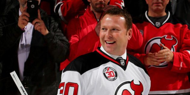 NEWARK, NJ - FEBRUARY 09: Former New Jersey Devils goaltender Martin Brodeur smiles as he leaves the ice after his jersey retirement ceremony before the game between the New Jersey Devils and the Edmonton Oilers on 9, 2016 at Prudential Center in Newark, New Jersey. (Photo by Elsa/Getty Images)