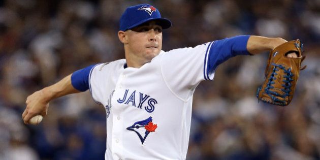 TORONTO, ON - OCTOBER 08: Aaron Sanchez #41 of the Toronto Blue Jays throws a pitch in the ninth inning against the Texas Rangers during game one of the American League Division Series at Rogers Centre on October 8, 2015 in Toronto, Ontario, Canada. (Photo by Vaughn Ridley/Getty Images)
