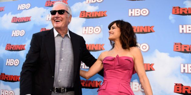 HOLLYWOOD, CA - JUNE 08: Executive Producer Jerry Weintraub and actress Carla Gugino arrive at the Premiere Of HBO's 'The Brink' at Paramount Studios on June 8, 2015 in Hollywood, California. (Photo by Frazer Harrison/Getty Images)