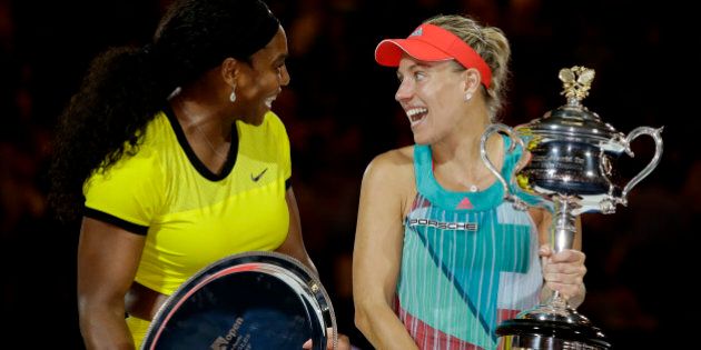 Angelique Kerber, right, of Germany talks with Serena Williams of the United States during the awarding ceremony after winning the women's singles final at the Australian Open tennis championships in Melbourne, Australia, Saturday, Jan. 30, 2016.(AP Photo/Aaron Favila)