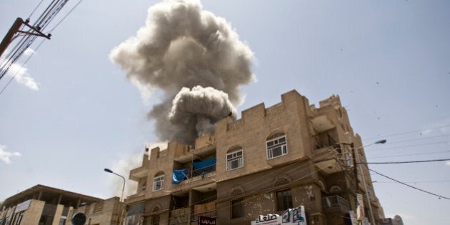 FILE - In this Sunday, May 10, 2015 file photo, Smoke rises from a house of former Yemeni president Ali Abdullah Saleh after a Saudi-led airstrike in Sanaa, Yemen. (AP Photo/Hani Mohammed, File)