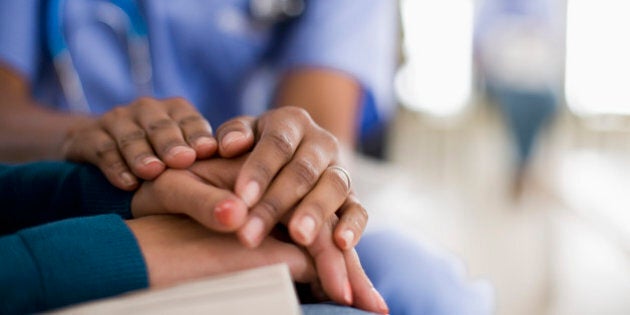 Nurse Comforting Patient