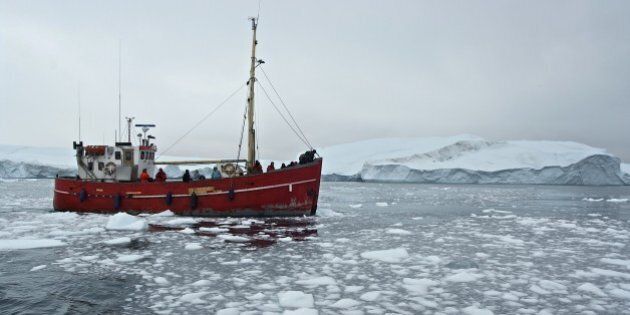 GREENLAND - AUGUST 02: Ship among the icebergs that have broken off the Sermeq Kujalleq ice sheet, Ilulissat, Qaasuitsup, Greenland. (Photo by DeAgostini/Getty Images)