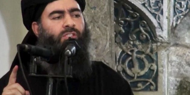 FILE - This file image made from video posted on a militant website Saturday, July 5, 2014, purports to show the leader of the Islamic State group, Abu Bakr al-Baghdadi, delivering a sermon at a mosque in Iraq during his first public appearance. How rooted in Islam is the ideology embraced by the Islamic State group that has inspired so many to fight and die? The group has assumed the mantle of Islam's earliest years, claiming to recreate the conquests and rule of the Prophet Muhammad and his successors. But in reality its ideology is a virulent vision all its own, one that its adherents have plucked from centuries of traditions. (AP Photo/Militant video, File)