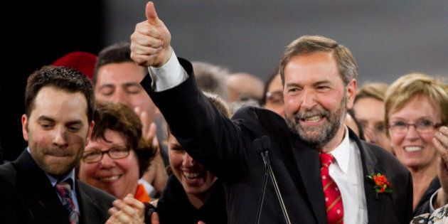 Thomas Mulcair celebrates his win at the NDP leadership convention in Toronto, Ontario, March 24, 2012. Canada's social democrats Saturday chose a firebrand center-leaning MP to run for prime minister in 2015, after the death of a leader who led them to into the opposition benches in a historic ballot last year. Former deputy leader Thomas Mulcair won the New Democratic Party nomination with 33,881 votes, beating out six rivals by vowing to track the NDP to the center to appeal to a broader electorate and consolidate its recent gains. AFP PHOTO / Geoff Robins (Photo credit should read GEOFF ROBINS/AFP/Getty Images)