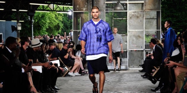 A model wears a creation as part of Givenchy's men's Spring-Summer 2016 fashion collection presented Friday, June 26, 2015 in Paris, France. (AP Photo/Zacharie Scheurer)