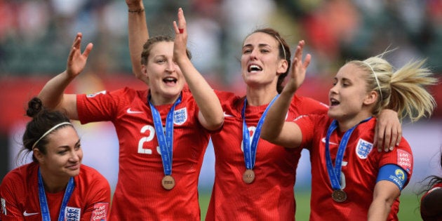 EDMONTON, AB - JULY 04: England players celebrate their third place after the FIFA Women's World Cup Canada 2015 Third Place Play-off match between Germany and England at Commonwealth Stadium on July 4, 2015 in Edmonton, Canada. (Photo by Dennis Grombkowski/Bongarts/Getty Images)