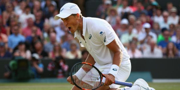 LONDON, ENGLAND - JULY 04: Vasek Pospisil of Canada celebrates after winning his Mens Singles Third Round match against James Ward of Great Britain during day six of the Wimbledon Lawn Tennis Championships at the All England Lawn Tennis and Croquet Club on July 4, 2015 in London, England. (Photo by Ian Walton/Getty Images)