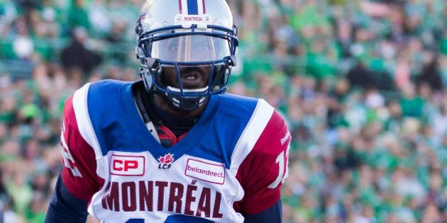 REGINA, SK - SEPTEMBER 27: Rakeem Cato #12 of the Montreal Alouettes after scoring a two point convert in the game between the Montreal Alouettes and Saskatchewan Roughriders in week 14 of the 2015 CFL season at Mosaic Stadium on September 27, 2015 in Regina, Saskatchewan, Canada. (Photo by Brent Just/Getty Images)