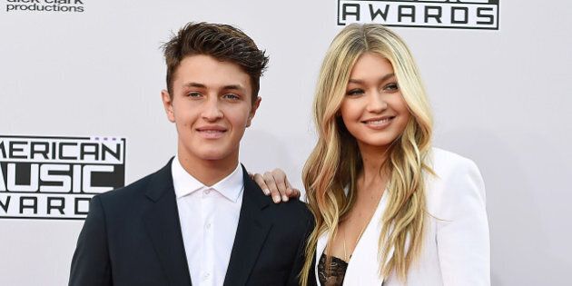 Anwar Hadid, left, and Gigi Hadid arrive at the 42nd annual American Music Awards at Nokia Theatre L.A. Live on Sunday, Nov. 23, 2014, in Los Angeles. (Photo by Jordan Strauss/Invision/AP)