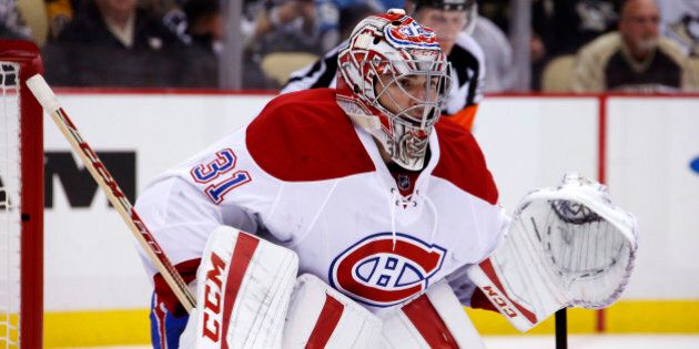 Montreal Canadiens goalie Carey Price (31) plays during an NHL hockey game against the Pittsburgh Penguins in Pittsburgh Tuesday, Oct. 13, 2015.(AP Photo/Gene J. Puskar