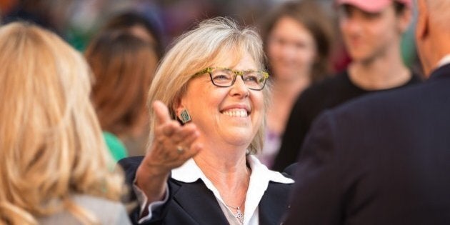 Green Party leader Elizabeth May greets dignitaries as she arrives for the first federal leaders debate on August 6, 2015 in Toronto, Canada. The federal election is set for October 19, 2015.AFP/ GEOFF ROBINS (Photo credit should read GEOFF ROBINS/AFP/Getty Images)