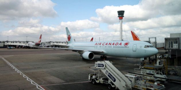 A grounded Air Canada plane at Terminal 3 Heathrow Airport in Middlesex which was closed for a second day after British airspace was closed due to ash from Iceland's volcanic eruption.