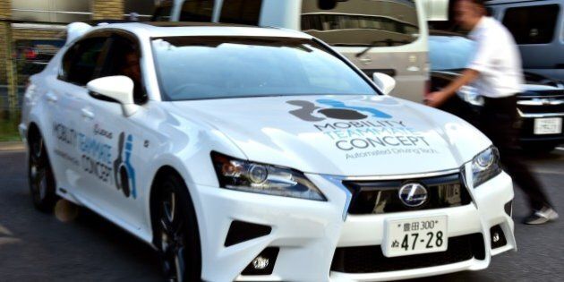Japan's auto giant Toyota demonstrates autonomous driving with a Lexus GS450h on the Tokyo metropolitan highway during Toyota's advanced technology presentation in Tokyo on October 6, 2015. Toyota is expecting to commercialise autonomous vehicles before the Tokyo Olympics in 2020. AFP PHOTO / Yoshikazu TSUNO (Photo credit should read YOSHIKAZU TSUNO/AFP/Getty Images)
