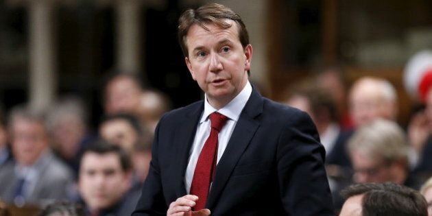 Canada's Treasury Board President Scott Brison speaks during Question Period in the House of Commons on Parliament Hill in Ottawa, Canada, December 10, 2015. REUTERS/Chris Wattie