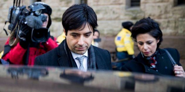 TORONTO, ON - FEBRUARY 11: Jian Ghomeshi (middle) leaves with co counsel Danielle Robitaille (left) and lawyer Marie Henein.Jian Ghomeshi exits the courthouse after his trial arguments ended. The verdict is to come March 24. (Carlos Osorio/Toronto Star via Getty Images)
