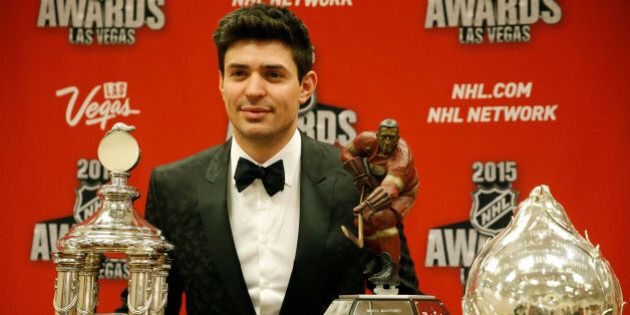 Carey Price of the Montreal Canadiens poses after winning several awards at the NHL Awards show Wednesday, June 24, 2015, in Las Vegas. (AP Photo/John Locher)