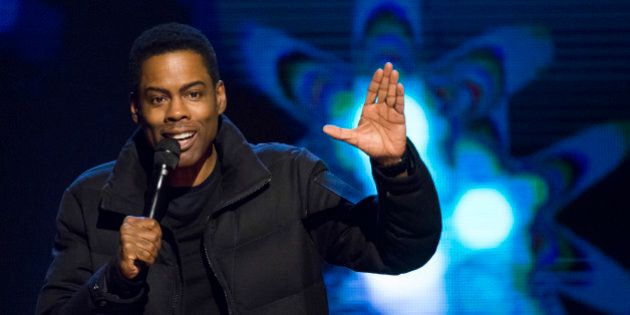 Chris Rock appears onstage at Comedy Central's