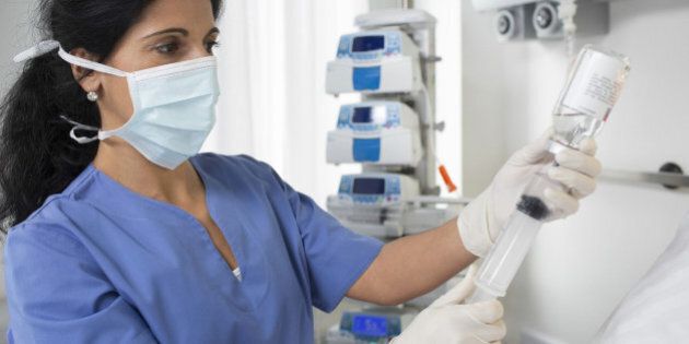 IMAGE DISTRIBUTED FOR FRESENIUS SE & CO. KGaA - This image released on Thursday, July 30, 2015 shows a nurse preparing an intravenously administered (I.V.) drug. Seen in the background are Agilia series infusion pumps for the administration of I.V. drugs. Fresenius Kabi, the leading supplier of I.V. generic drugs raises its 2015 earnings guidance after excellent financial results in the first half of 2015 and excellent prospects for the remainder of the year. For further information: http://www.fresenius.com/171.htm. Editorial use of this picture is free of charge. (Fresenius SE & Co. KGaA via AP Images)