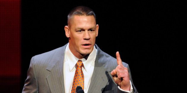 LAS VEGAS, NV - JANUARY 08: WWE wrestler John Cena speaks at a news conference announcing the WWE Network at the 2014 International CES at the Encore Theater at Wynn Las Vegas on January 8, 2014 in Las Vegas, Nevada. The network will launch on February 24, 2014 as the first-ever 24/7 streaming network, offering both scheduled programs and video on demand. The USD 9.99 per month subscription will include access to all 12 live WWE pay-per-view events each year. CES, the world's largest annual consumer technology trade show, runs through January 10 and is expected to feature 3,200 exhibitors showing off their latest products and services to about 150,000 attendees. (Photo by Ethan Miller/Getty Images)