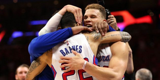 LOS ANGELES, CA - MAY 02: Blake Griffin #32 and Matt Barnes #22 of the Los Angeles Clippers embrace at the final buzzer against the San Antonio Spurs during Game Seven of the Western Conference quarterfinals of the 2015 NBA Playoffs at Staples Center on May 2, 2015 in Los Angeles, California. The Clippers won 111-109 to win the series four games to three. NOTE TO USER: User expressly acknowledges and agrees that, by downloading and or using this photograph, User is consenting to the terms and conditions of the Getty Images License Agreement. (Photo by Stephen Dunn/Getty Images)