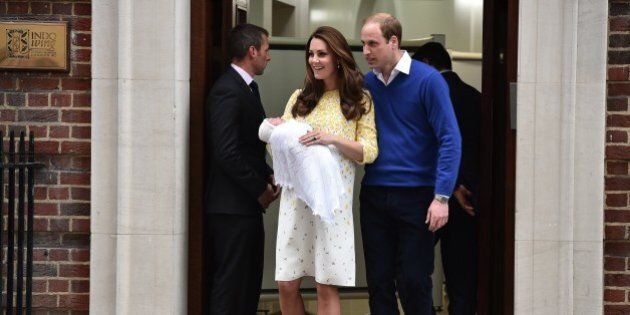 Britain's Prince William, Duke of Cambridge, and his wife Catherine, Duchess of Cambridge show their newly-born daughter, their second child, to the media outside the Lindo Wing at St Mary's Hospital in central London, on May 2, 2015. The Duchess of Cambridge was safely delivered of a daughter weighing 8lbs 3oz, Kensington Palace announced. The newly-born Princess of Cambridge is fourth in line to the British throne. AFP PHOTO / BEN STANSALL (Photo credit should read LEON NEAL/AFP/Getty Images)