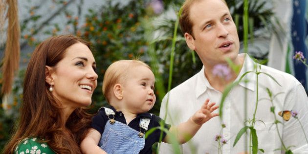 FILE - This photo taken Wednesday, July 2, 2014, and released Monday, July 21, 2014, to mark Prince George's first birthday, shows Britain's Prince William and Kate Duchess of Cambridge and the Prince during a visit to the Sensational Butterflies exhibition at the Natural History Museum, London. The Duchess of Cambridge, wife of Prince William, is expecting her second child and was being treated for severe morning sickness, royal officials said Monday, Sept. 8, 2014. (AP Photo/John Stillwell, Pool)