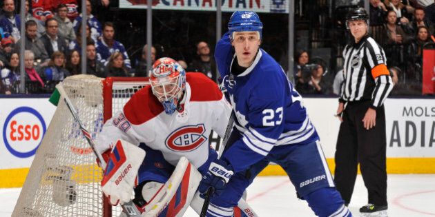 TORONTO, ON - JANUARY 23: Shawn Matthias #23 of the Toronto Maple Leafs skates in front of goalie Mike Condon #39 of the Montreal Canadiens during NHL game action January 23, 2016 at Air Canada Centre in Toronto, Ontario, Canada. (Photo by Graig Abel/NHLI via Getty Images)