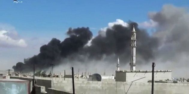 In this image made from video provided by Homs Media Centre, which has been verified and is consistent with other AP reporting, smoke rises after airstrikes by military jets in Talbiseh of the Homs province, western Syria, Wednesday, Sept. 30, 2015. Russian military jets carried out airstrikes in Syria for the first time on Wednesday, targeting what Moscow said were Islamic State positions. U.S. officials and others cast doubt on that claim, saying the Russians appeared to be attacking opposition groups fighting Syrian government forces. (Homs Media Centre via AP)