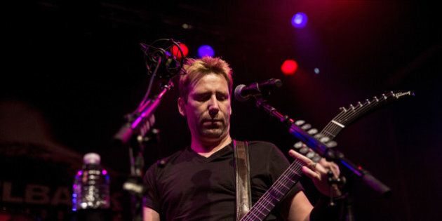 WEST HOLLYWOOD, CA - NOVEMBER 05: Chad Kroeger of Nickelback performs on stage at the special announcement and live performance at the House of Blues on the Sunset Strip November 5, 2014 in West Hollywood, California. (Photo by Mark Davis/Getty Images)