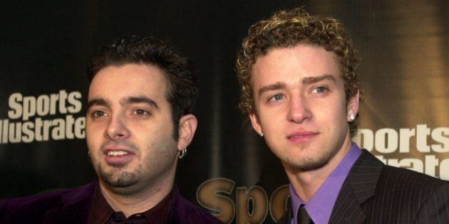 Chris Kirkpatrick, left, and Justin Timberlake from the pop group *NSYNC arrive at the Sports Illustrated's Sportsman of the Year Awards in New York, Tuesday, Dec. 12, 2000. (AP Photo/Stephen Chernin)