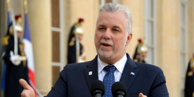 Prime Minister of Quebec Philippe Couillard makes a statement following his meeting with French president at the Elysee Palace, on December 7, 2015, in Paris. / AFP / BERTRAND GUAY (Photo credit should read BERTRAND GUAY/AFP/Getty Images)