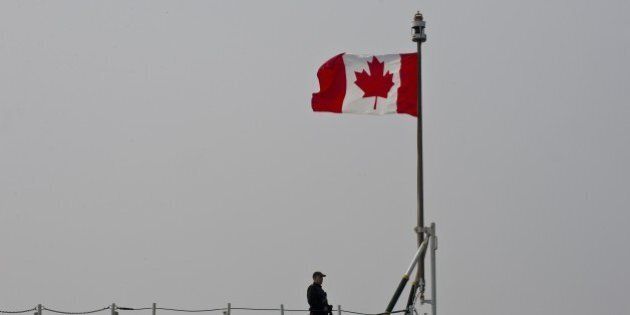 A Canadian soldier stands on board of the HMCS Fredericton ship docked at Constanta harbor in Constanta, Romania, on March 13, 2015. NATO Standing Maritime Group-2 (SNMG-2) is one of four groups of the multinational naval NATO forces and is headed by US Admiral Brad Williamson. The group consists of four frigates from Canada, Turkey, Italy and Romania, a cruiser (US ship commander) and an auxiliary vessel from Germany. Romanian Naval Forces are represented in the group by HMS London, other ships are the cruiser USS Vicksburg (USA), frigates HMCS Fredericton (Canada), TCG Turgutreis (Turkey), ITS FGS Spessart Aliseo (Italy) and auxiliary ship FGS Spessart (Germany). The participation of the Romanian Navy at SNMG action group 2 of the Black Sea was planned in 2014 and has as main objective the development of Romanian military interoperability with military sailors of NATO. AFP PHOTO / DANIEL MIHAILESCU (Photo credit should read DANIEL MIHAILESCU/AFP/Getty Images)
