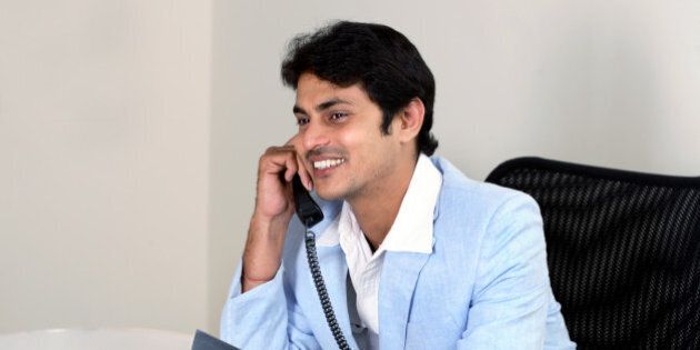 A man talking over the phone