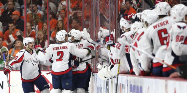 PHILADELPHIA, PA - APRIL 24: Nicklas Backstrom #19 of the Washington Capitals celebrates a goal with teammates against the Philadelphia Flyers during the second period in Game Six of the Eastern Conference Quarterfinals during the 2016 NHL Stanley Cup Playoffs at Wells Fargo Center on April 24, 2016 in Philadelphia, Pennsylvania. (Photo by Patrick Smith/Getty Images)