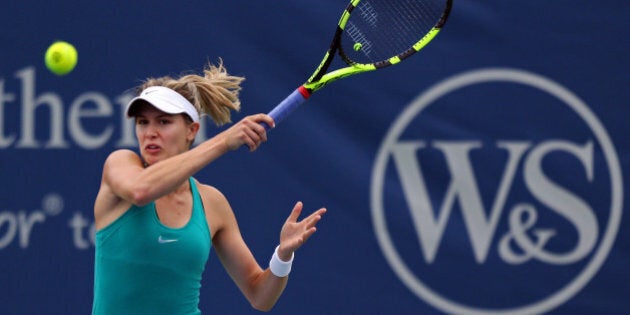 Aug 16, 2016; Mason, OH, USA; Eugenie Bouchard (CAN) returns a shot against Barbora Strycova (CZE) on day four during the Western and Southern tennis tournament at Linder Family Tennis Center. Mandatory Credit: Aaron Doster-USA TODAY Sports