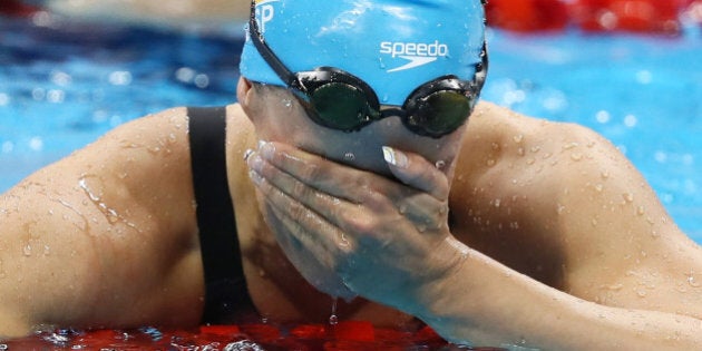 Rio Olympics - Swimming - Final - Women's 200m Butterfly Final - Olympic Aquatics Stadium - Rio de Janeiro, Brazil - 10/08/2016. Mireia Belmonte (ESP) of Spain celebrates after winning the gold medal. REUTERS/Stefan Wermuth FOR EDITORIAL USE ONLY. NOT FOR SALE FOR MARKETING OR ADVERTISING CAMPAIGNS.