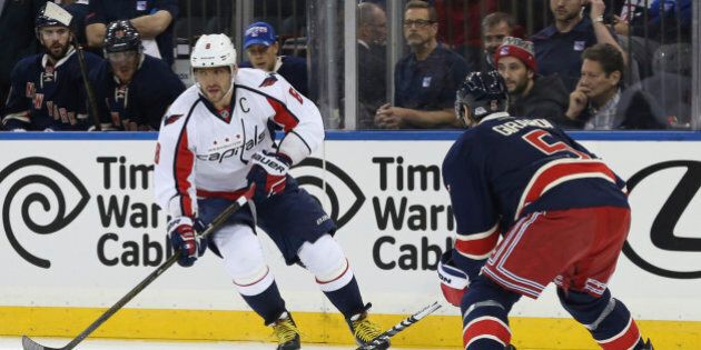 Washington Capitals left wing Alex Ovechkin (8) skates against New York Rangers defenseman Dan Girardi (5) during the first period of an NHL hockey game, Saturday, Jan. 9, 2016, at Madison Square Garden in New York. (AP Photo/Mary Altaffer)