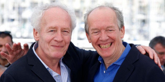 Directors Jean-Pierre Dardenne (L) and Luc Dardenne pose during a photocall for the film