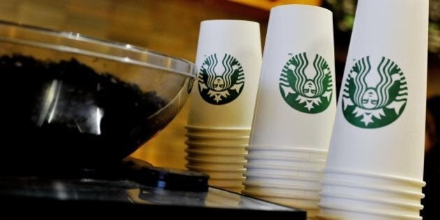 File photo 13/8/2013 of Starbucks takeaway cups. There are "shocking" amounts of sugar found in a number of hot drinks regularly bought on Britain's high streets, Action on Sugar has said.