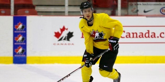 TORONTO, ON - DECEMBER 11: Brayden Point looks to pass the puck during the World Junior hockey hockey selection camp in Toronto, Ontario. (Todd Korol/Toronto Star via Getty Images)