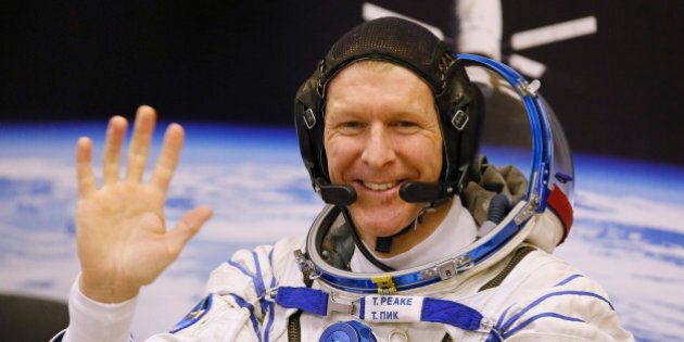 British astronaut Tim Peake, member of the main crew of the expedition to the International Space Station (ISS), gestures prior the launch of Soyuz TMA-19M space ship at the Russian leased Baikonur cosmodrome, Kazakhstan, Tuesday, Dec. 15, 2015. Peake, the first Briton to represent the European Space Agency aboard the International Space Station, will be away from the planet for six months but looks forward to Earthly pleasures like seeing the new Star Wars movie and having a Christmas pudding. (AP Photo/Dmitry Lovetsky)