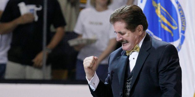 National anthem singer Rene Rancourt reacts after singing the Star Spangled Banner before Game 4 of the NHL hockey Stanley Cup finals between the Vancouver Canucks and the Boston Bruins, Wednesday, June 8, 2011, in Boston. The Canucks lead the Bruins 2-1 in the best-of-seven games series. (AP Photo/Elise Amendola)