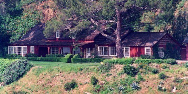 ** FOR RELEASE WEEKEND EDITIONS, AUG. 8-9, AND THEREAFTER ** FILE - This 1992 file photo shows the Benedict Canyon estate, sheltered in the hills of Los Angeles, where actress Sharon Tate was murdered along with four others on the night of Aug. 9, 1969. Forty years ago, Manson