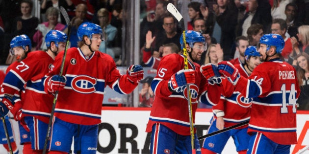 MONTREAL, QC - MAY 09: The Montreal Canadiens celebrate their victory over the Tampa Bay Lightning in Game Five of the Eastern Conference Semifinals during the 2015 NHL Stanley Cup Playoffs at the Bell Centre on May 9, 2015 in Montreal, Quebec, Canada. The Canadiens defeated the Lightning 2-1. The Lightning lead the series 3-2. (Photo by Minas Panagiotakis/Getty Images)