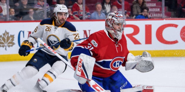 MONTREAL, QC - JANUARY 21: Buffalo Sabres left wing Matt Moulson (26) gets into position behind Montreal Canadiens goalie Carey Price (31) during the third period of the NHL regular season game between the Buffalo Sabres and the Montreal Canadiens on January 21, 2017, at the Bell Centre in Montreal, QC (Photo by Vincent Ethier/Icon Sportswire via Getty Images)